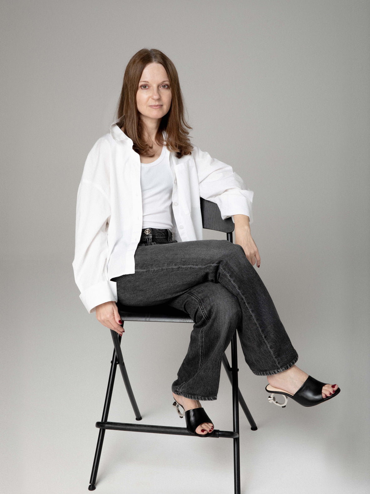 Portrait of Evgenia S, designer and founder of En Talons, showcasing passion and creativity in shoe design.