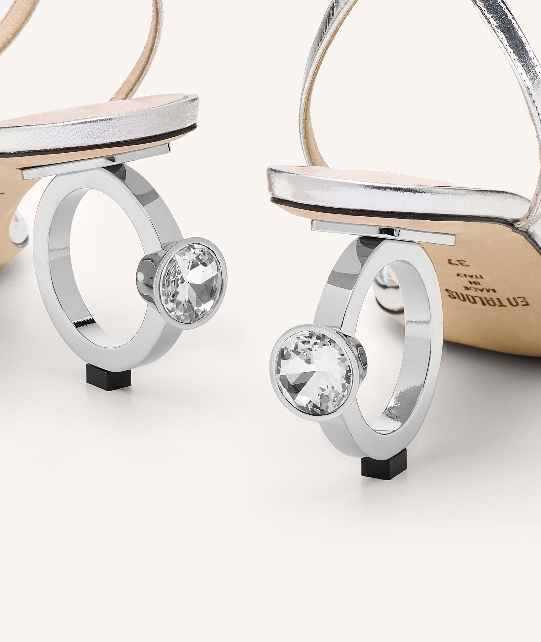 Silver sandals La Bague with a back view.